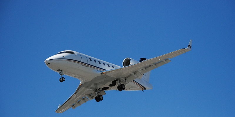 Airplane in the blue sky