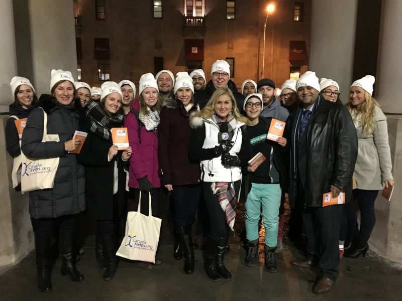 The team of CanadaHelps staff, volunteers and charities at Union Station with Jennifer Valentyne (Breakfast Television Toronto)