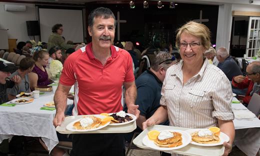 Volunteers serving